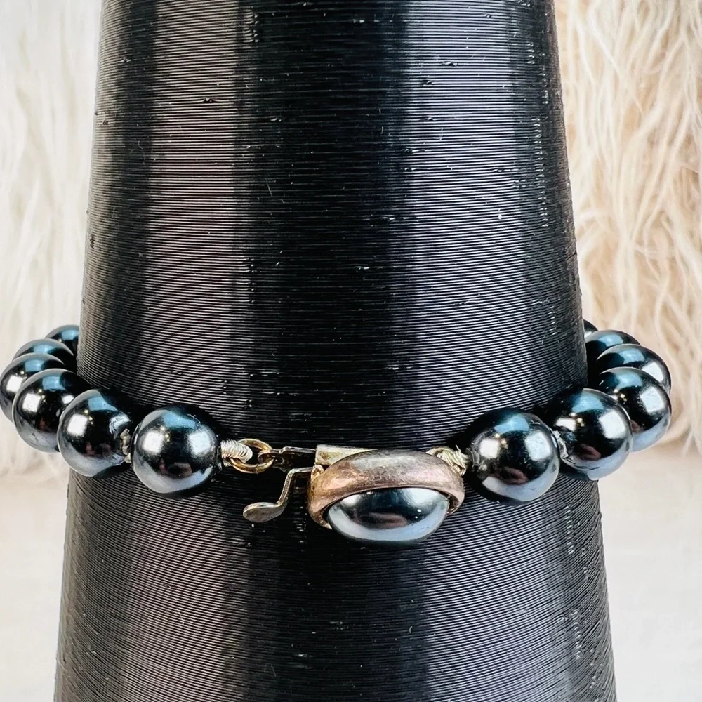 Beautiful vintage aged Silvertone weighted bracelet